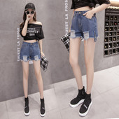 Női rövid farmer új modell, szakadt motívumokkal