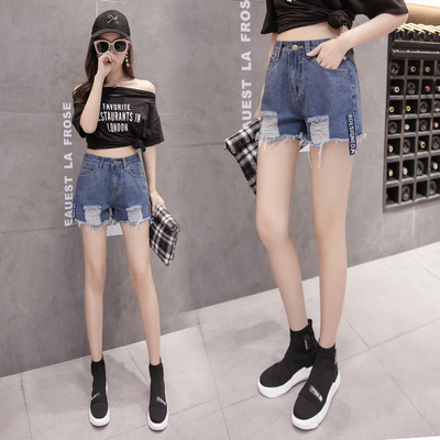 Női rövid farmer új modell, szakadt motívumokkal