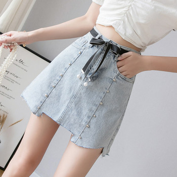 Asümmeetriline naiste teksaseelik kabe ja vööga