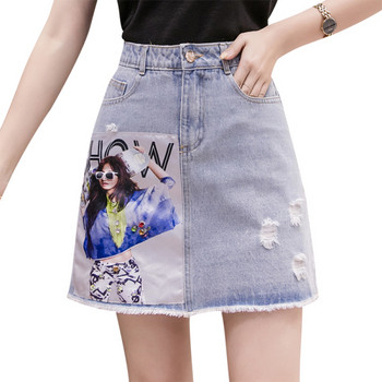 Modern női farmerszoknya flitterekkel, szakadt motívumokkal