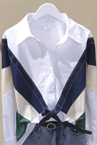 Aktuāls sieviešu krekls ar klasisku apkakli un lentīti