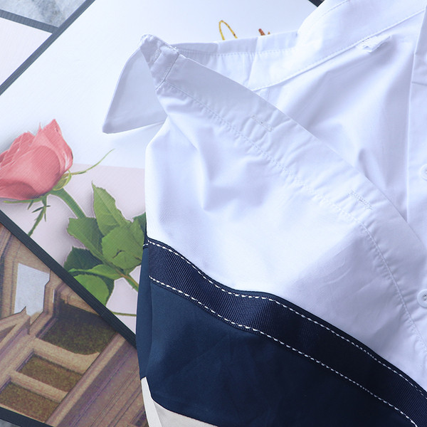 Aktuāls sieviešu krekls ar klasisku apkakli un lentīti