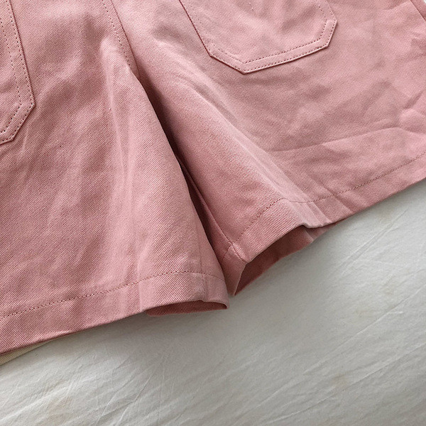 Sieviešu ikdienas kombinezons ar kabatām un izšuvumiem