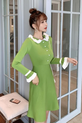 Sieviešu pavasara kleita retro stilā ar cirtām un pogām