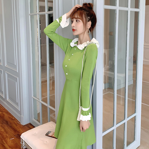 Sieviešu pavasara kleita retro stilā ar cirtām un pogām