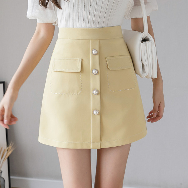 Novi model ženske suknje sa džepovima i gumbima