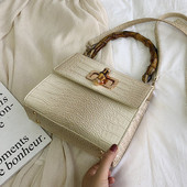 Moderna sieviešu ādas soma ar diviem rokturiem