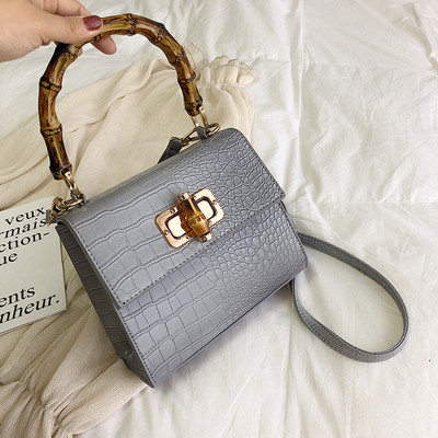 Moderna sieviešu ādas soma ar diviem rokturiem