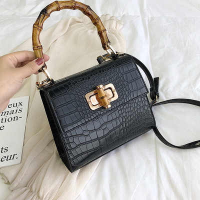 Moderna sieviešu ādas soma ar diviem rokturiem