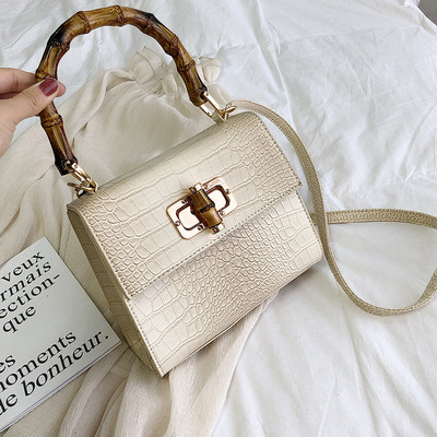 Moderna sieviešu ādas soma ar diviem rokturiem