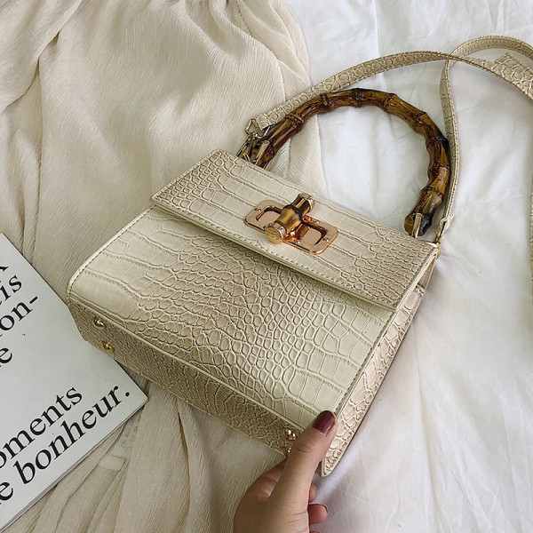 Moderna sieviešu ādas soma ar diviem rokturiem