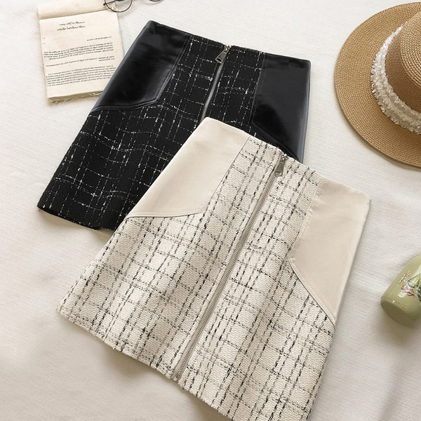 Kockás női szoknya magas derékkal, bőr elemekkel és cipzárral