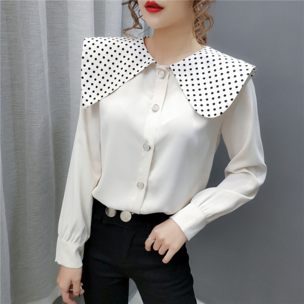 Naujo modelio moteriški marškiniai su ovalia iškirpte su taškeliais