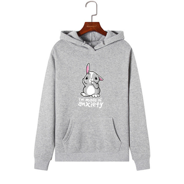 Modern női pulóver kapucnival és rátéttel