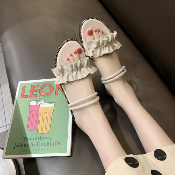 Modernas sieviešu sandales ar plakanām zolēm