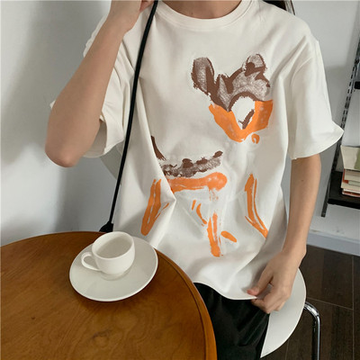 Széles női póló ovális nyakkivágással és rátéttel