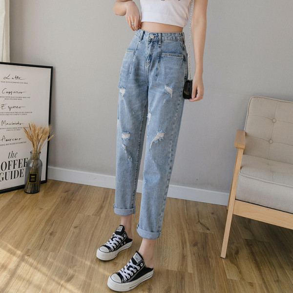 Mūsdienīgi sieviešu džinsi ar augstu vidukli un plēstiem elementiem