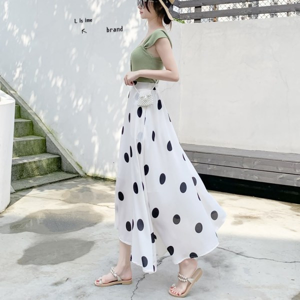 Modern női pöttyös szoknya zsebekkel