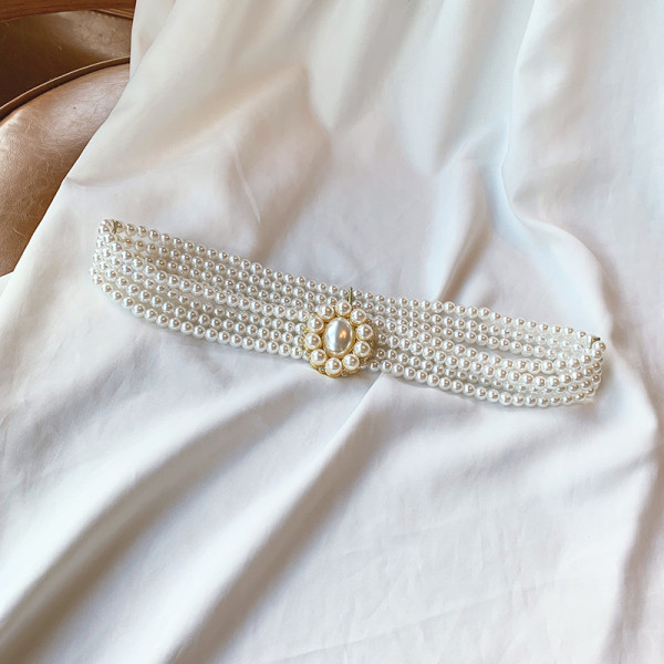 Aktuális gyöngyház női öv különböző csatokkal