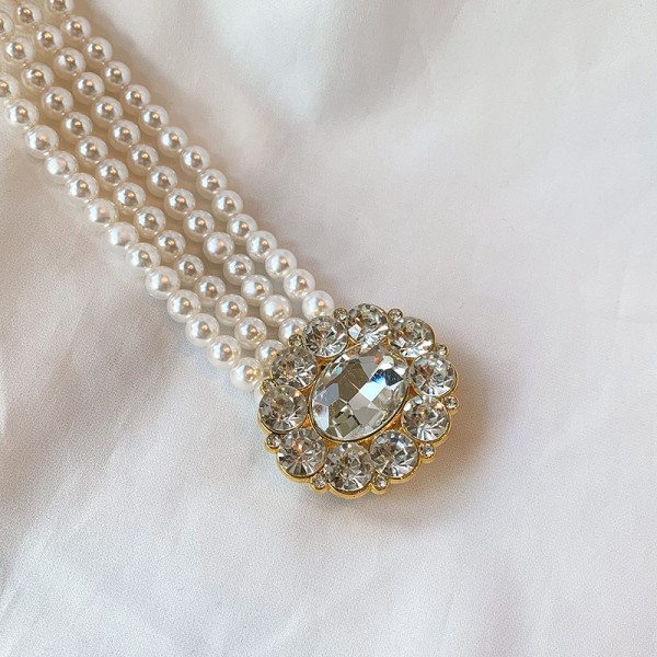 Aktuális gyöngyház női öv különböző csatokkal