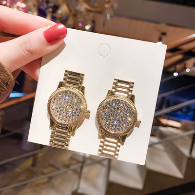 Auksiniai moteriški laikrodžio formos auskarai