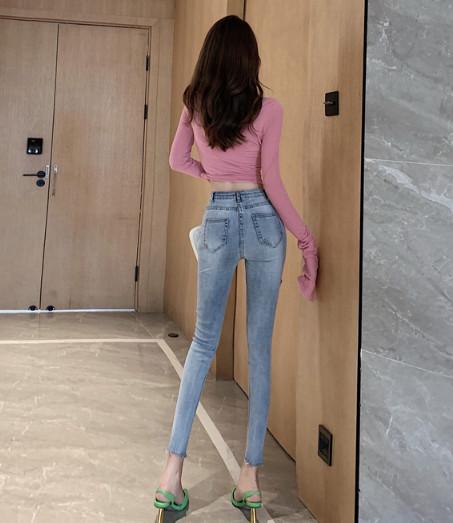 Testre szabott női farmer új modellje, magas derékkal, szakadt kék motívummal