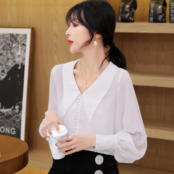 Női alkalmi ing spitz nyakkivágással, gombokkal és hosszú ujjakkal