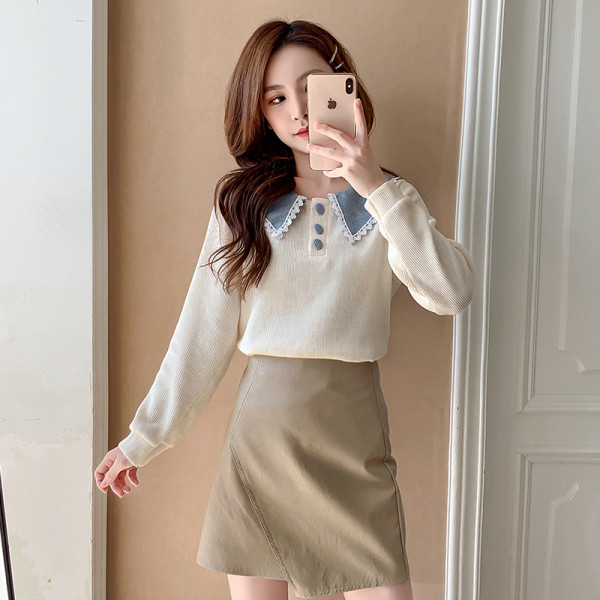 Šiuolaikinė moteriška palaidinė su ovalia iškirpte ir sagomis