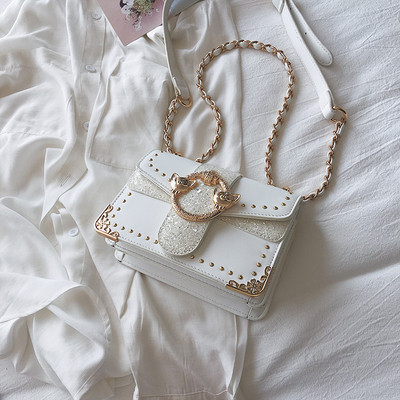 Öko-nahast moodne naiste kott metallist elementidega