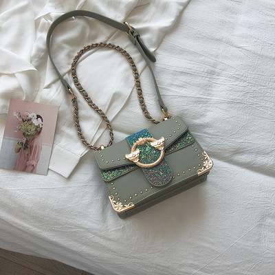 Öko-nahast moodne naiste kott metallist elementidega