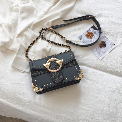 Öko-nahast moodne naiste kott metallist elementidega