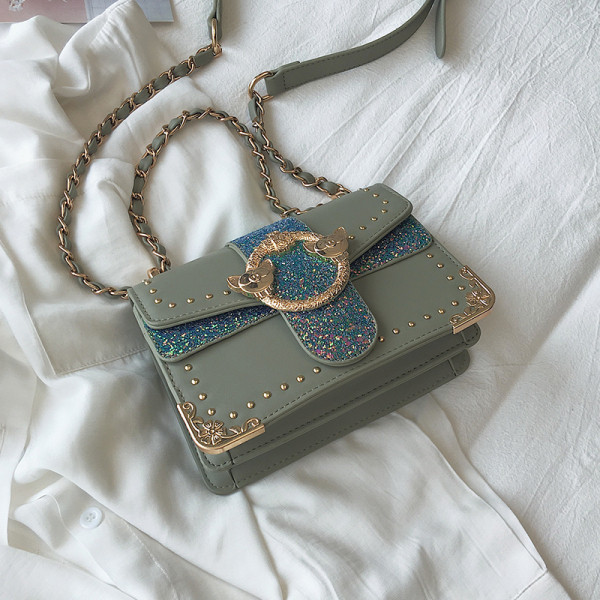 Öko-nahast moodne naiste kott metallist elementidega