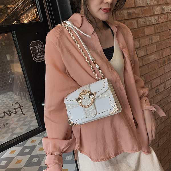 Öko-nahast moodne naiste kott metallist elementidega