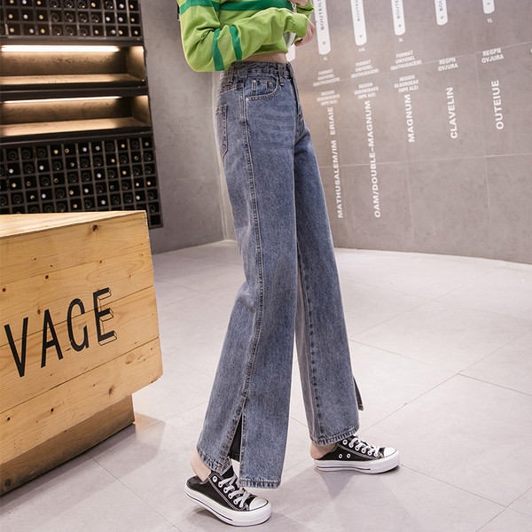 Női alkalmi farmer egyenes modell magas derékkal és hasítékkal