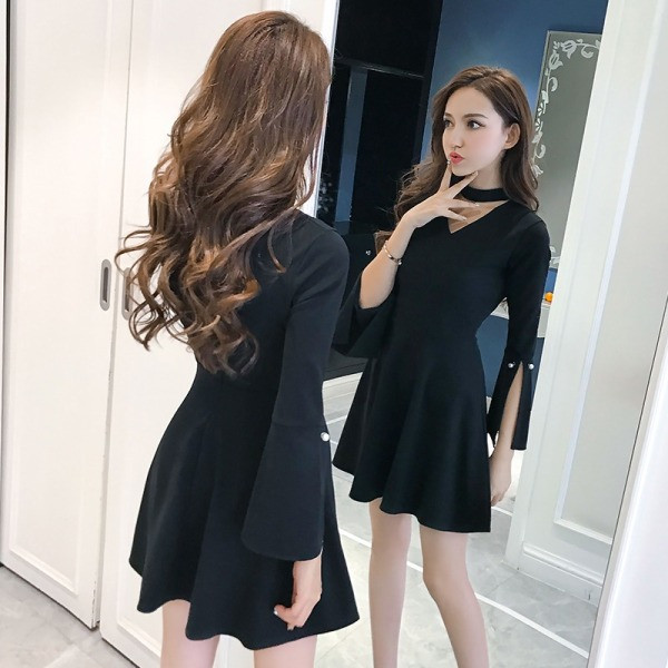 Ženska haljina izrezanog modela s V izrezom i biserima