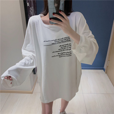 Bluză de damă lată, cu mâneci lungi și cu fantă