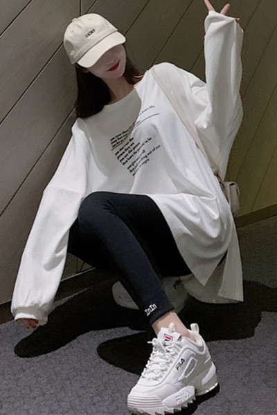 Bluză de damă lată, cu mâneci lungi și cu fantă