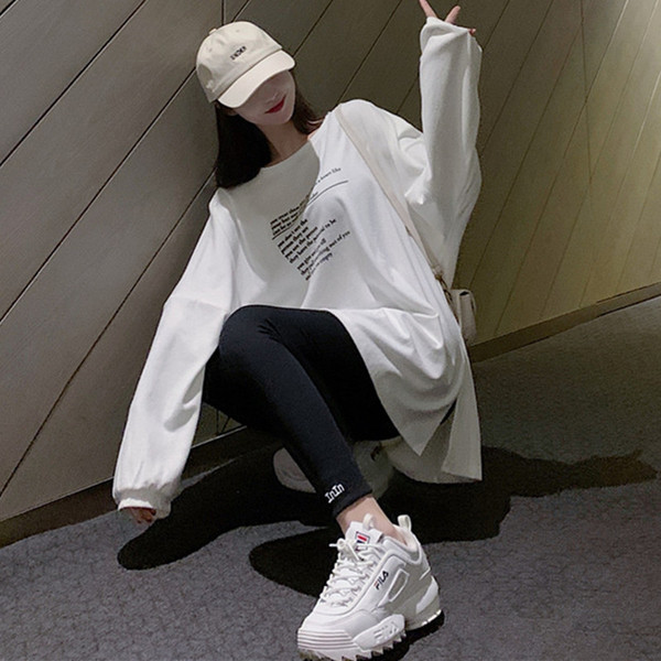 Bluză de damă lată, cu mâneci lungi și cu fantă