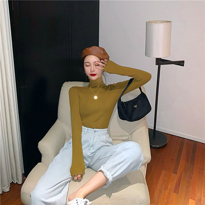 Bluză de damă mulata cu guler înalt