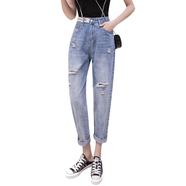 Ženske traperice visokog struka poderanih motiva dužine 9/10