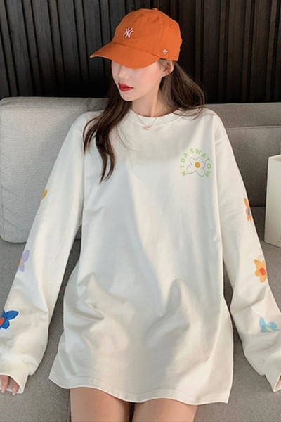 Široka ženska bluza s ovalnim izrezom i printom u boji