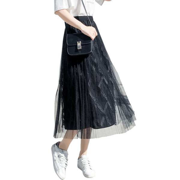 Hosszú női szoknya gumírozott derékkal és tüllvel