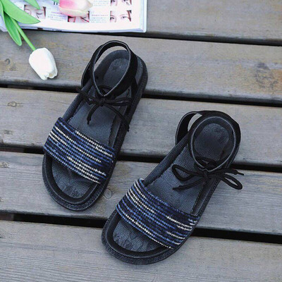 Alkalmi női szandál lapos talppal és bokakötővel