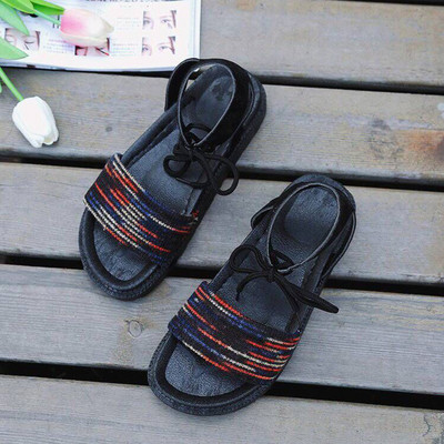 Alkalmi női szandál lapos talppal és bokakötővel