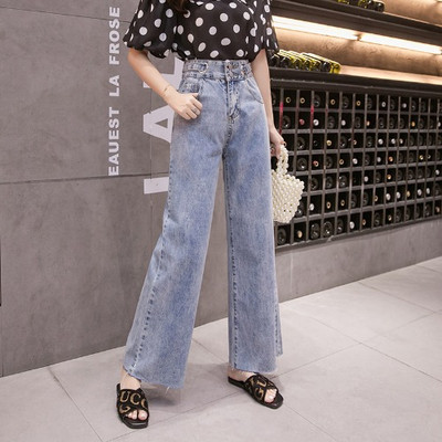 Model larg de blugi de dama cu talie inalta