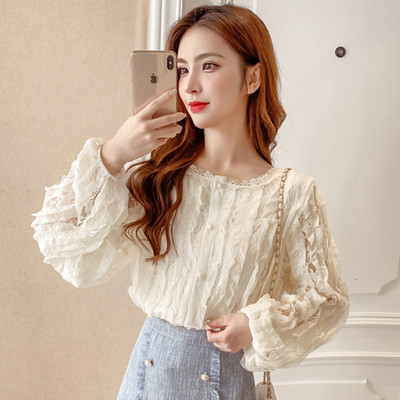 Moderna ženska košulja s okruglim izrezom i dugim rukavima