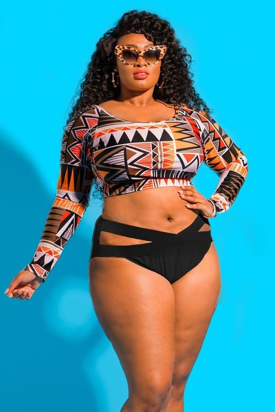 Divdaļīgs peldkostīms ar garām piedurknēm