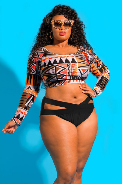 Divdaļīgs peldkostīms ar garām piedurknēm