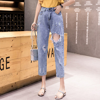 Modernus moteriškų džinsų tiesus modelis su suplyšusiais motyvais 9/10 ilgio