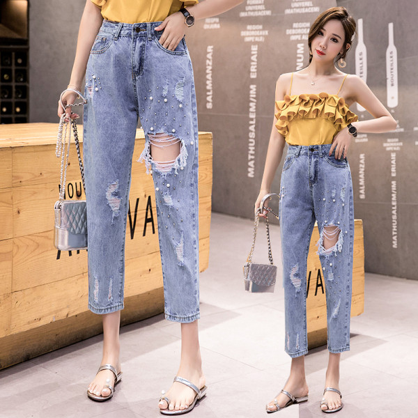 Modernus moteriškų džinsų tiesus modelis su suplyšusiais motyvais 9/10 ilgio